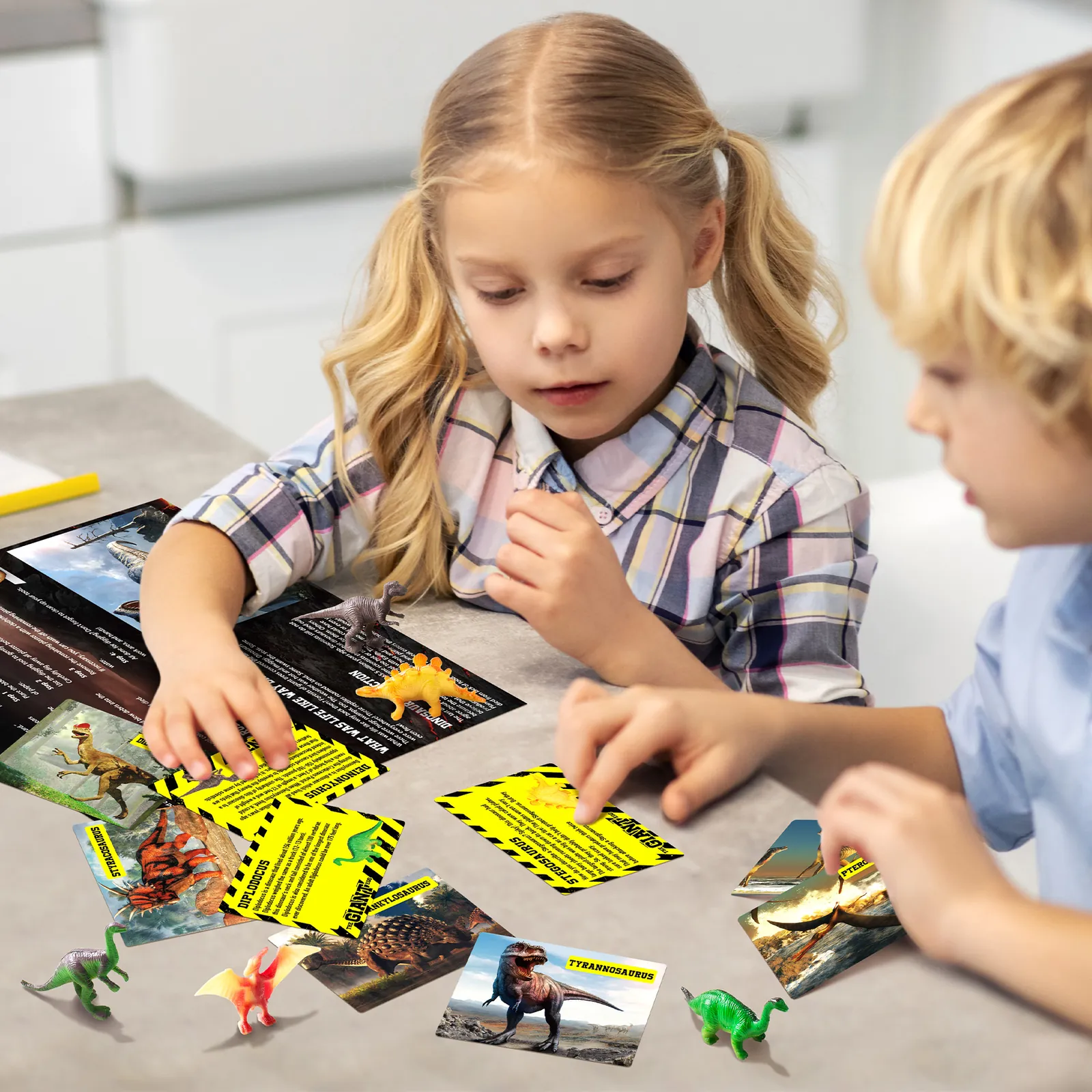 Children comparing dinosaur figures with the included learning cards